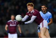 2 February 2019; Peter Cooke of Galway passes off under pressure from Niall Scully of Dublin during the Allianz Football League Division 1 Round 2 match between Dublin and Galway at Croke Park in Dublin. Photo by Piaras Ó Mídheach/Sportsfile