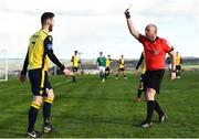 2 February 2019; Referee Graham Kelly shows a yellow card to Shane Elworthy of Longford Town during a Pre-Season Friendly between Cork City and Longford Town in Mayfield United, Mayfield, Cork. Photo by Eóin Noonan/Sportsfile