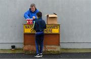 3 February 2019; A young Clare supporter buys a match programme prior to the Allianz Hurling League Division 1A Round 2 match between Clare and Kilkenny at Cusack Park in Ennis, Co. Clare. Photo by Brendan Moran/Sportsfile