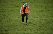 3 February 2019; A groundsman attempts to repair divots at half time during the Allianz Football League Division 2 Round 2 match between Cork and Kildare at Páirc Uí Chaoimh in Cork. Photo by Eóin Noonan/Sportsfile