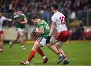 3 February 2019; Andy Moran of Mayo takes a forward mark ahead of Matthew Donnelly of Tyrone during the Allianz Football League Division 1 Round 2 match between Tyrone and Mayo at Healy Park in Omagh, Tyrone. Photo by Oliver McVeigh/Sportsfile