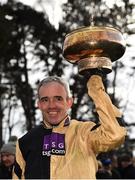 3 February 2019; Jockey Ruby Walsh celebrates with the trophy after winning the Unibet Irish Gold Cup on Bellshill during Day Two of the Dublin Racing Festival at Leopardstown Racecourse in Dublin. Photo by Seb Daly/Sportsfile