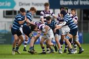 3 February 2019; Inigo Cruise-O'Brien of Clongowes Wood College is tackled by Kian Crosby, left, and Lorcan McKenna of Castleknock College during the Bank of Ireland Leinster Schools Junior Cup Round 1 match between Clongowes Wood College and Castleknock College at Energia Park in Dublin. Photo by Daire Brennan/Sportsfile