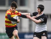 5 February 2019; James Nicholson of Temple Carrig School is tackled by Calum Corcoran of Newbridge College during the Bank of Ireland Leinster Schools Junior Cup Round 1 match between Newbridge College and Temple Carrig School at Energia Park in Dublin. Photo by Harry Murphy/Sportsfile