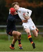 5 February 2019; Jack Murphy of Presentation College Bray is tackled by Daniel Campbell of Wesley College during the Bank of Ireland Leinster Schools Junior Cup Round 1 match between Wesley College and Presentation College Bray at Kirwan Park in Dublin. Photo by Eóin Noonan/Sportsfile