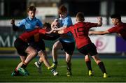 8 February 2019; Tiernan Hurley of St Michael's College is tackled by Charlie McLaughlin, left, and Matthew McDonald of CBC Monkstown during the Bank of Ireland Leinster Schools Junior Cup Round 1 match between St Michael's College and C.B.C. Monkstown at Energia Park in Dublin. Photo by David Fitzgerald/Sportsfile