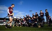 9 February 2019; Eunan McKillop of Ruairí Óg, left, joins his team-mates for their team photo prior to the AIB GAA Hurling All-Ireland Senior Championship Semi-Final match between St Thomas' and Ruairí Óg at Parnell Park in Dublin. Photo by David Fitzgerald/Sportsfile
