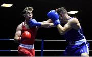 9 February 2019; Patrick Donovan, left, in action against Conor Ivors in their 69kg bout during the 2019 National Elite Men’s & Women’s Elite Boxing Championships at the National Stadium in Dublin. Photo by David Fitzgerald/Sportsfile