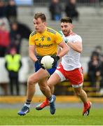 10 February 2019; Enda Smith of Roscommon in action against Padraig Hampsey of Tyrone during the Allianz Football League Division 1 Round 3 match between Roscommon and Tyrone at Dr. Hyde Park in Roscommon. Photo by Seb Daly/Sportsfile
