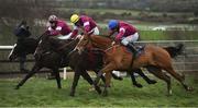 10 February 2019; Dounikos, with Davy Russell up, right, jumps the last on their way to winning alongside, eventual third place finisher, General Principle, with Jack Kennedy up, centre, and eventual second place finisher, Wishmoor, with Andrew Ring up, during the BoyleSports Grand National Trial Handicap Steeplechase on-board Dounikos at Punchestown Racecourse in Naas, Co. Kildare. Photo by David Fitzgerald/Sportsfile