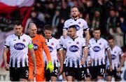 9 February 2019; Dundalk captain Brian Gartland leads his side out prior to the 2019 President's Cup Final between Cork City and Dundalk at Turners Cross in Cork. Photo by Stephen McCarthy/Sportsfile