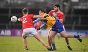 10 February 2019; Sean Collins of Clare in action against Kevin O'Donovan, left, and Tómas Clancy of Cork during the Allianz Football League Division 2 Round 3 match between Clare and Cork at Cusack Park in Ennis, Clare. Photo by Sam Barnes/Sportsfile