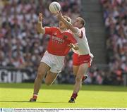 28 September 2003; Paddy McKeever, Armagh, in action against Brian McGuigan, Tyrone. Bank of Ireland All-Ireland Senior Football Championship Final, Armagh v Tyrone, Croke Park, Dublin. Picture credit; David Maher  / SPORTSFILE *EDI*