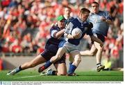 28 September 2003; Colm Kelly, Laois, scores his sides only goal despite the attentions of Dublin goalkeeper Kieran Walsh. All-Ireland Minor Football Championship Final, Dublin v Laois, Croke Park, Dublin. Picture credit; Ray McManus / SPORTSFILE