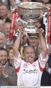 28 September 2003; Tyrone captain Peter Canavan lifts the Sam Maguire cup after victory over Armagh. Bank of Ireland All-Ireland Senior Football Championship Final, Armagh v Tyrone, Croke Park, Dublin. Picture credit; Matt Browne / SPORTSFILE *EDI*