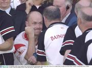 28 September 2003; Tyrone captain Peter Canavan celebrates with manager Mickey Harte after victory over Armagh. Bank of Ireland All-Ireland Senior Football Championship Final, Armagh v Tyrone, Croke Park, Dublin. Picture credit; Matt Browne / SPORTSFILE *EDI*