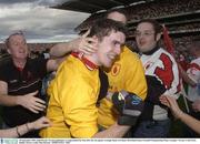 28 September 2003; John Devine, Tyrone goalkeeper, is congratulated by fans after the win against Armagh. Bank of Ireland All-Ireland Senior Football Championship Final, Armagh v Tyrone, Croke Park, Dublin. Picture credit; Matt Browne / SPORTSFILE *EDI*