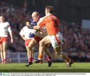 28 September 2003; Peter Canavan, Tyrone, in action against Armagh's Enda McNulty. Bank of Ireland All-Ireland Senior Football Championship Final, Armagh v Tyrone, Croke Park, Dublin. Picture credit; Matt Browne / SPORTSFILE *EDI*