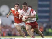 28 September 2003; Enda McGinley, Tyrone, in action against Armagh's Tony McEntee. Bank of Ireland All-Ireland Senior Football Championship Final, Armagh v Tyrone, Croke Park, Dublin. Picture credit; Matt Browne / SPORTSFILE *EDI*