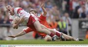 28 September 2003; Brian McGuigan, Tyrone, in action against Armagh's Paul McGrane. Bank of Ireland All-Ireland Senior Football Championship Final, Armagh v Tyrone, Croke Park, Dublin. Picture credit; Matt Browne / SPORTSFILE *EDI*