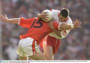 28 September 2003; Ciaran Gourley, Tyrone, in action against Tony McEntee, Armagh. Bank of Ireland All-Ireland Senior Football Championship Final, Armagh v Tyrone, Croke Park, Dublin. Picture credit; David Maher / SPORTSFILE *EDI*