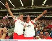 28 September 2003; Tyrone's Kevin Hughes and Brian McGuigan, right, celebrate victory over Armagh. Bank of Ireland All-Ireland Senior Football Championship Final, Armagh v Tyrone, Croke Park, Dublin. Picture credit; Brendan Moran / SPORTSFILE