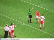 28 September 2003; Armagh's Diarmuid Marsden is sent off by referee Brian White after fouling Tyrone's Philip Jordan. Bank of Ireland All-Ireland Senior Football Championship Final, Armagh v Tyrone, Croke Park, Dublin. Picture credit; Brendan Moran / SPORTSFILE