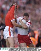 28 September 2003; Colin Holmes, Tyrone, in action against Philip Loughran, Armagh. Bank of Ireland All-Ireland Senior Football Championship Final, Armagh v Tyrone, Croke Park, Dublin. Picture credit; Pat Murphy / SPORTSFILE *EDI*