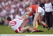 28 September 2003; Colin Holmes, Tyrone, in action against Philip Loughran, Armagh. Bank of Ireland All-Ireland Senior Football Championship Final, Armagh v Tyrone, Croke Park, Dublin. Picture credit; Pat Murphy / SPORTSFILE *EDI*