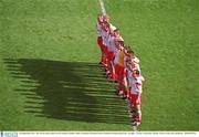 28 September 2003; The Tyrone team stands for the National Anthem. Bank of Ireland All-Ireland Senior Football Championship Final, Armagh v Tyrone, Croke Park, Dublin. Picture credit; Ray McManus / SPORTSFILE