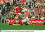 28 September 2003; Tyrone's Conor Gormley blocks a late shot from Armagh's Steven McDonnell. Bank of Ireland All-Ireland Senior Football Championship Final, Armagh v Tyrone, Croke Park, Dublin. Picture credit; Brendan Moran / SPORTSFILE