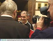 29 September 2003; Tyrone manager Mickey Harte is interviewed by reporters prior to their departure from the hotel for their home coming in Tyrone. Burlington Hotel, Dublin. Picture credit; Pat Murphy / SPORTSFILE *EDI*