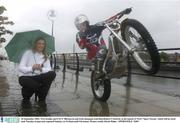 30 September 2003; TG4 weather girl S’le N’ Bhraonáin and Irish champion trial biker Robert Crawford, at the launch of TG4's 'Sport Xtreme' which will be aired each Tuesday at 6pm and repeated Sundays at 10.30am until Christmas. Picture credit; David Maher / SPORTSFILE *EDI*