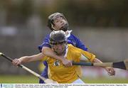 4 October 2003; Jane Adams, Antrim, in action against Tipperary's Deirdre McDonnell. All-Ireland Intermediate Camogie Championship Final, Antrim v Tipperary, Pairc Tailteann, Navan, Co. Meath. Picture credit; Matt Browne / SPORTSFILE *EDI*