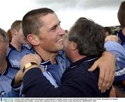 4 October 2003; Dublin captain Alan Brogan is congratulated by manager Tommy Lyons at the final whistle after victory over Tyrone. All-Ireland U21 Football Championship Final, Dublin v Tyrone, Pairc Tailteann, Navan, Co. Meath. Picture credit; Matt Browne / SPORTSFILE *EDI*