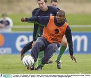 7 October 2003; Republic of Ireland's Clinton Morrison in action against team-mate Gary Breen during squad training. Malahide Football Club, Malahide, Co. Dublin. Soccer. Picture credit; David Maher / SPORTSFILE *EDI*