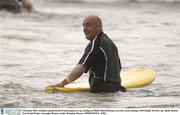 8 October 2003; Ireland captain Keith Wood prepares to go surfing on Shelly Beach during a rest day from training. 2003 Rugby World Cup, Shelly Beach, New South Wales, Australia. Picture credit; Brendan Moran / SPORTSFILE *EDI*