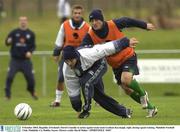 8 October 2003; Republic of Ireland's David Connolly in action against team-mate Graham Kavanagh, right, during squad training. Malahide Football Club, Malahide, Co. Dublin. Soccer. Picture credit; David Maher / SPORTSFILE *EDI*