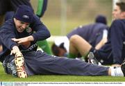 8 October 2003; Republic of Ireland's John O'Shea stretching during squad training. Malahide Football Club, Malahide, Co. Dublin. Soccer. Picture credit; David Maher / SPORTSFILE *EDI*