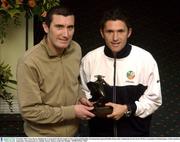 8 October 2003; Jason Byrne, Shelbourne, is presented with the trophy by first cousin and Republic of Ireland International Robbie Keane after winning the eircom Soccer Writers Association of Ireland player of the month for September. Portrmarnock, Co. Dublin. Soccer. Picture credit; Pat Murphy / SPORTSFILE *EDI*