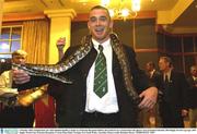 9 October 2003; Ireland back row Alan Quinlan handles a snake at a Welcome Reception held by the Gosford City Council where the players were presented with their 2003 Rugby World Cup caps. 2003 Rugby World Cup, Welcome Reception, Crowne Plaza Hotel, Terrigal, New South Wales, Australia. Picture credit; Brendan Moran / SPORTSFILE *EDI*