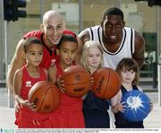 9 October 2003; Notre Dame's Domenico Marcario, left and Bruce Jolly with, from left, 5 year old twins Lewis and Eithan Ntibimenya, Amy and sister Laura Roantree at the launch of the ESB Super League season and the launch of Basketball Ireland. Clarion Hotel, Dublin. Picture credit; Ray McManus / SPORTSFILE *EDI*