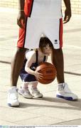 9 October 2003; 3 year old Laura Roantree with Notre Dame's Bruce Jolly at the launch of the ESB Super League season and of Basketball Ireland. Clarion Hotel, Dublin. Picture credit; Ray McManus / SPORTSFILE *EDI*
