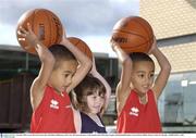 9 October 2003; 5 year old twins Lewis, left, and Eithan Ntibimenya with 3 year old Laura Roantree at the launch of the ESB Super League and Basketball Ireland. Clarion Hotel, Dublin. Picture credit; Pat Murphy / SPORTSFILE *EDI*
