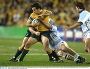 10 October 2003; Brendan Cannon, Australia, in action against Ignacio Fernandez Lobbe, Argentina. 2003 Rugby World Cup, Pool A, Australia v Argentina, Telstra Stadium, Homebush Bay, Sydney, New South Wales, Australia. Picture credit; Brendan Moran / SPORTSFILE *EDI*