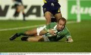 11 October 2003; Denis Hickie, Ireland, scores his sides 5th try and his second against Romania. 2003 Rugby World Cup, Pool A, Ireland v Romania, Central Coast Stadium, Gosford, New South Wales, Australia. Picture credit; Brendan Moran / SPORTSFILE *EDI*