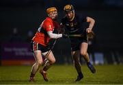 12 February 2019; James Bergin of DCU Dóchas Éireann in action against Niall O'Leary of UCC during the Electric Ireland Fitzgibbon Cup Semi-Final match between University College Cork and DCU Dóchas Éireann at the WIT Sports Campus in Carriganore, Waterford. Photo by Harry Murphy/Sportsfile