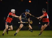 12 February 2019; Rian McBride of DCU Dóchas Éireann in action against Eoghan Murphy, left and Paddy O'Loughlin of UCC during the Electric Ireland Fitzgibbon Cup Semi-Final match between University College Cork and DCU Dóchas Éireann at the WIT Sports Campus in Carriganore, Waterford. Photo by Harry Murphy/Sportsfile
