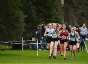 13 February 2019; Aoife O'Cuill of Maynooth Post Primary, Co. Kildare, left, races alongside Danielle Donegan of Sacred Heart, Tullamore, Co. Offaly, centre, and Amy Rose Farrell of Mount Anville, Goatstown, Co. Dublin, right, on her way to winning the Senior Girls 2500m during the Irish Life Health Leinster Schools Cross Country at Santry Demesne in Co. Dublin. Photo by Seb Daly/Sportsfile