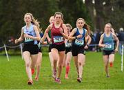 13 February 2019; Aoife O'Cuill of Maynooth Post Primary, Co. Kildare, left, races alongside Danielle Donegan of Sacred Heart, Tullamore, Co. Offaly, centre, and Amy Rose Farrell of Mount Anville, Goatstown, Co. Dublin, right, on her way to winning the Senior Girls 2500m during the Irish Life Health Leinster Schools Cross Country at Santry Demesne in Co. Dublin. Photo by Seb Daly/Sportsfile